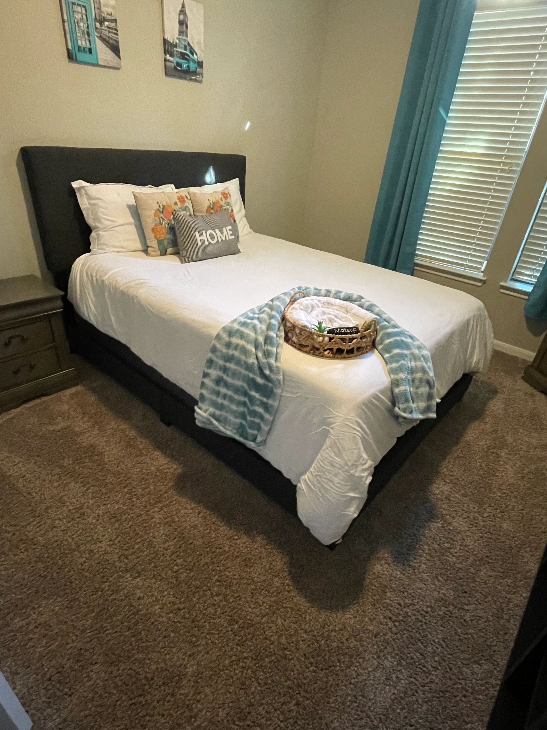 A bedroom prepared with fresh linens