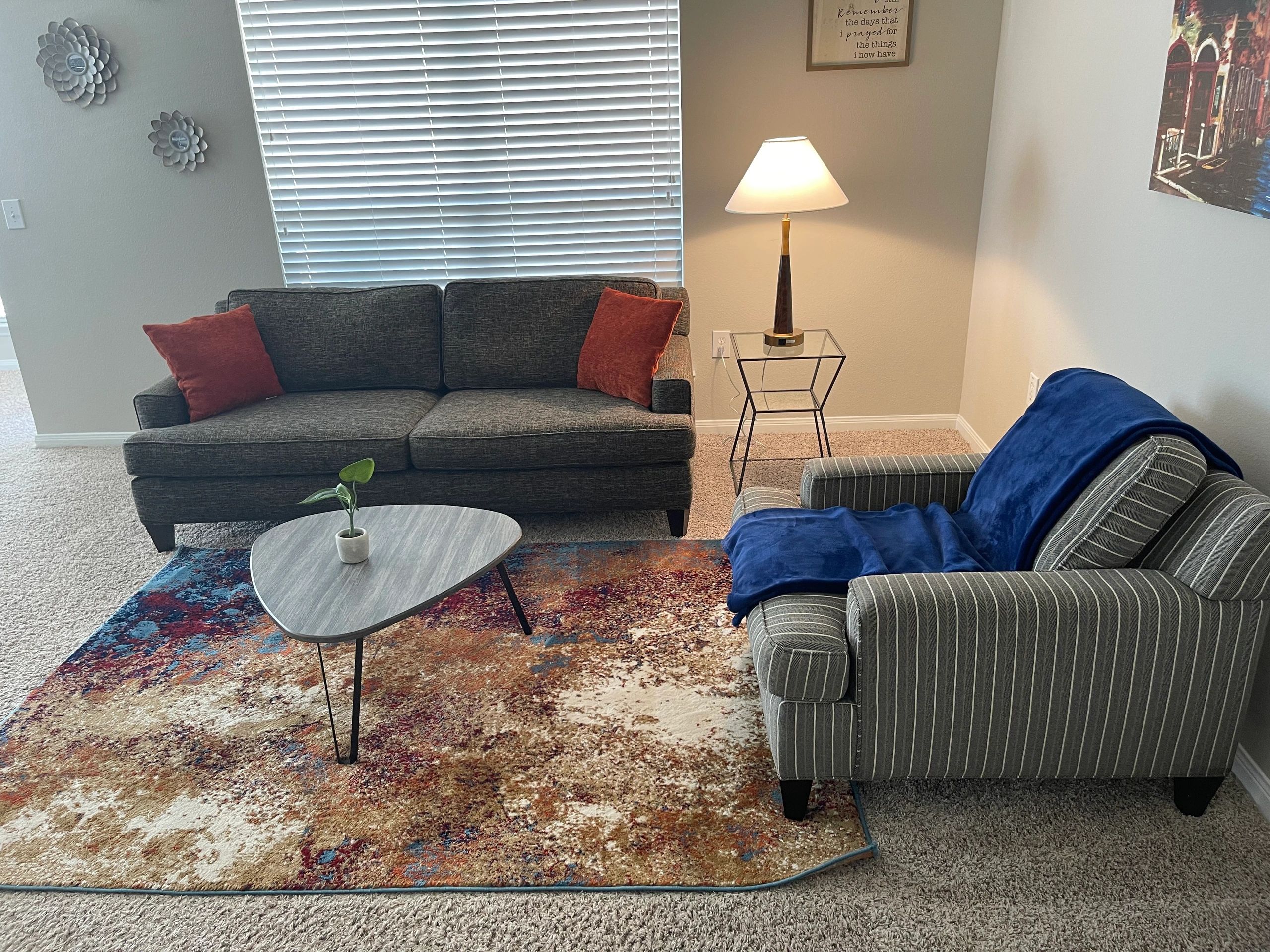 A neatly staged vacation rental living room from Triage’s existing property gallery